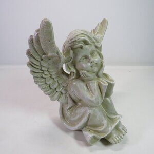 angel cherub sitting taupe colored flat bottom resin 7" tall
